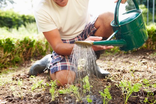 Gardening service team handling outdoor maintenance paperwork
